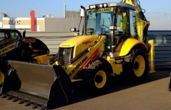 Экскаватор погрузчик с отвалом и ковшом ООО Автотехком Экскаватор погрузчик с отвалом и ковшом ООО Автотехком